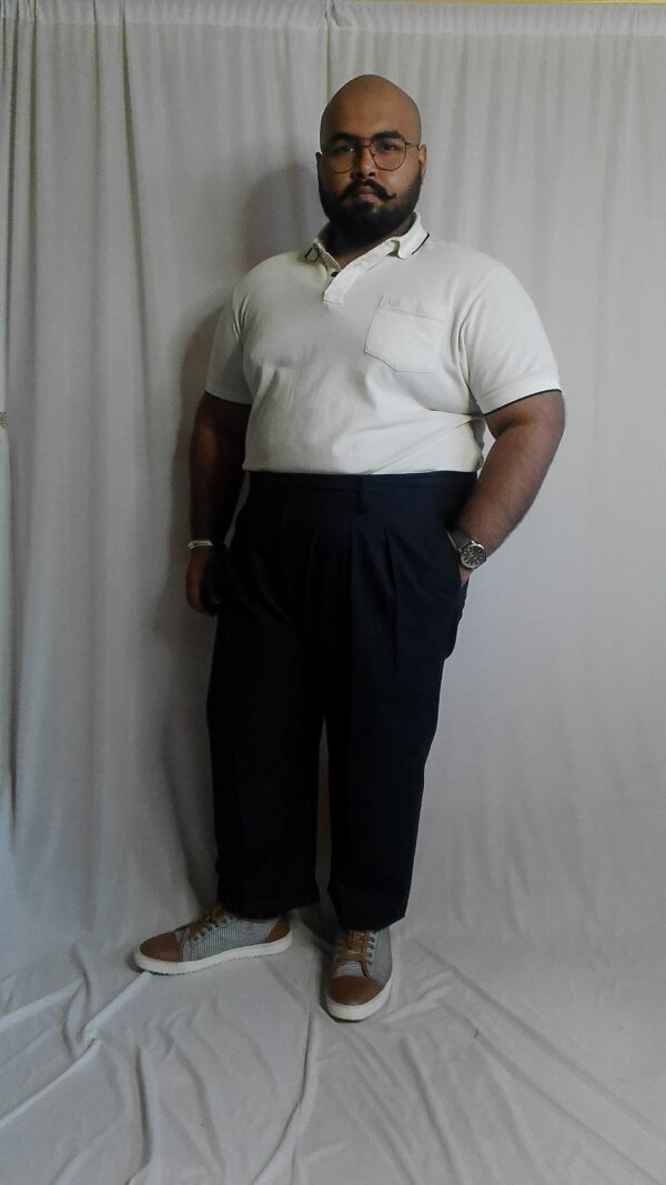 Super 140s high rise navy Italian trousers styled with a polo tshirt