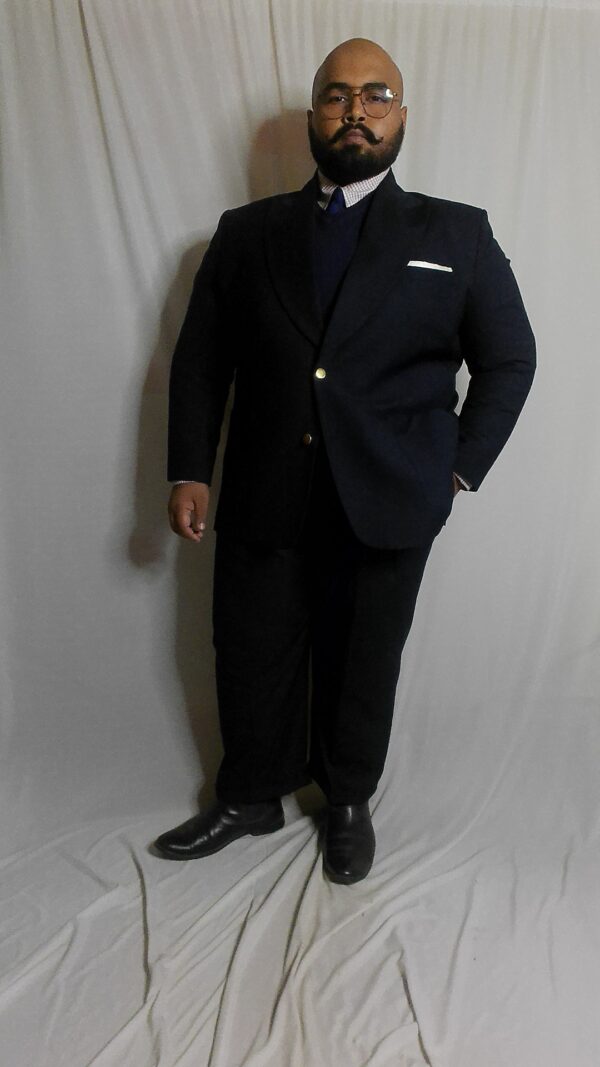 Super 140s Navy Blazer with Brass buttons layered with a V neck Sweater