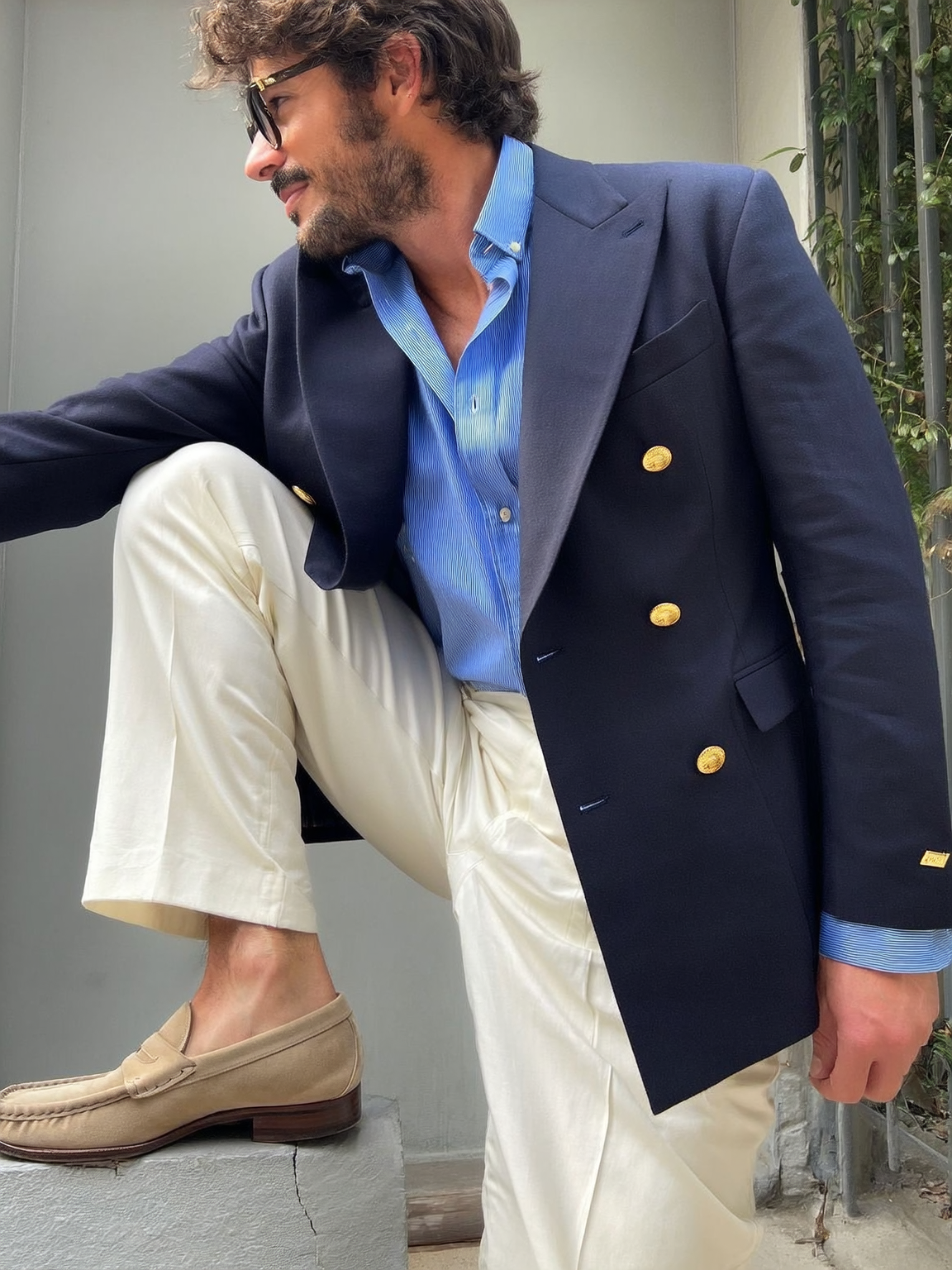 Classic Double Breasted Super 140s Navy Merino Wool Blazer with Gold Brass buttons styled with ivory trouser and a blue pencil striped shirt Classic Double Breasted Super 140s Navy Merino Wool Blazer with Gold Brass buttons styled with ivory trouser and a blue pencil striped shirt